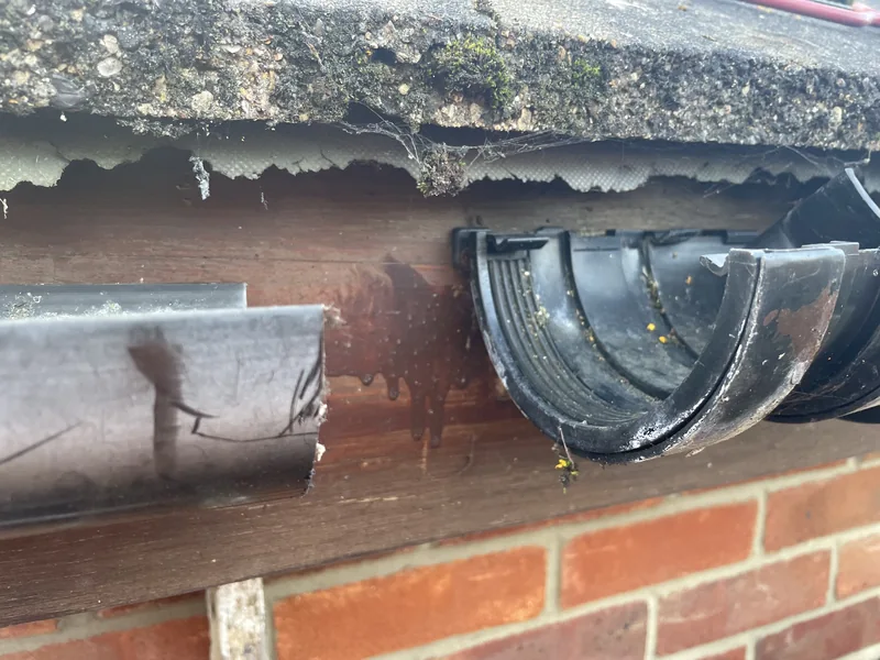 Separated round-line gutter and union, exposing the rubber seal